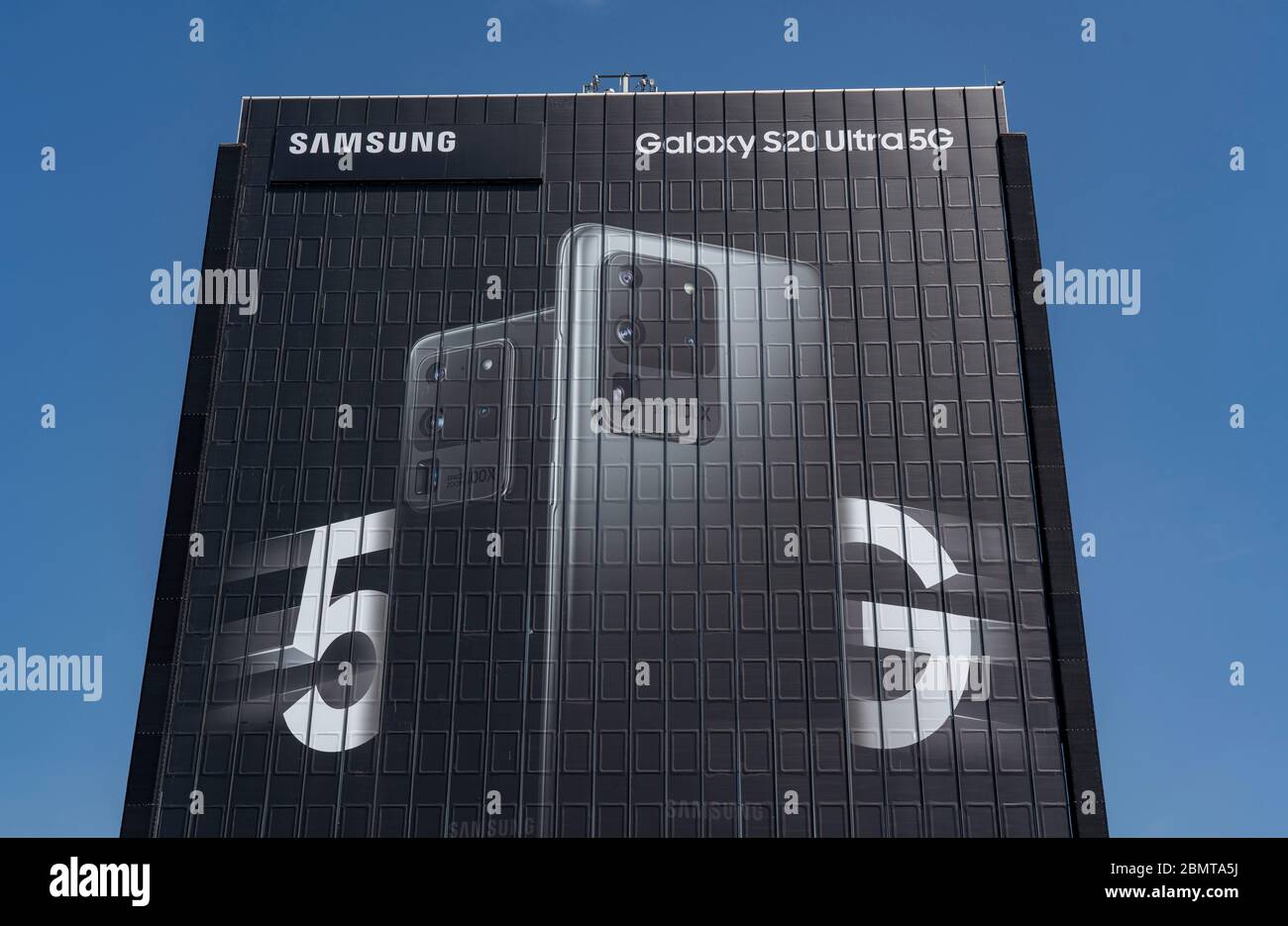 Large-scale advertising for the new Samsung Galaxy S20 Ultra 5G mobile phone, on the facades of the former Stinnes building at Rhein-Ruhr-Zentrum, on Stock Photo