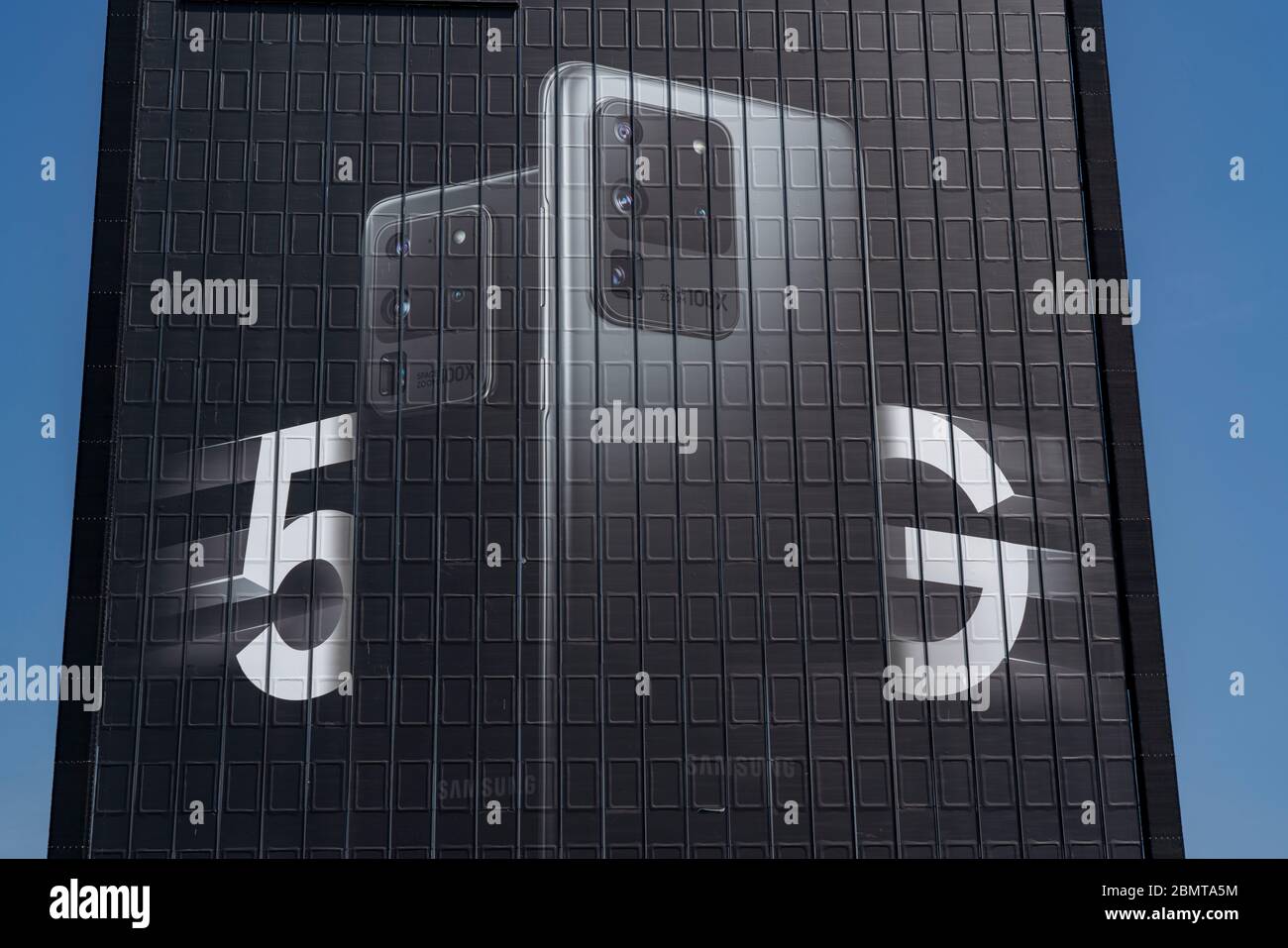 Large-scale advertising for the new Samsung Galaxy S20 Ultra 5G mobile phone, on the facades of the former Stinnes building at Rhein-Ruhr-Zentrum, on Stock Photo