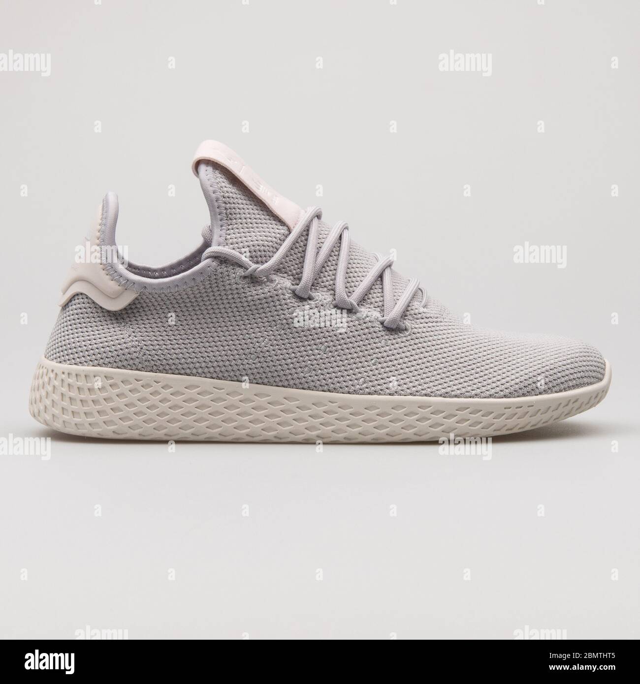 VIENNA, AUSTRIA - FEBRUARY 14, 2018: Adidas PW Tennis HU grey sneaker on  white background Stock Photo - Alamy