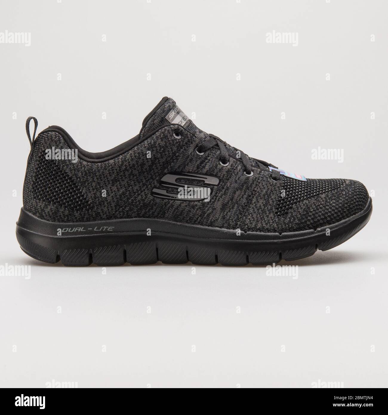 VIENNA, AUSTRIA - FEBRUARY 14, 2018: Skechers Flex Appeal 2.0 High Energy  black and grey sneaker on white background Stock Photo - Alamy