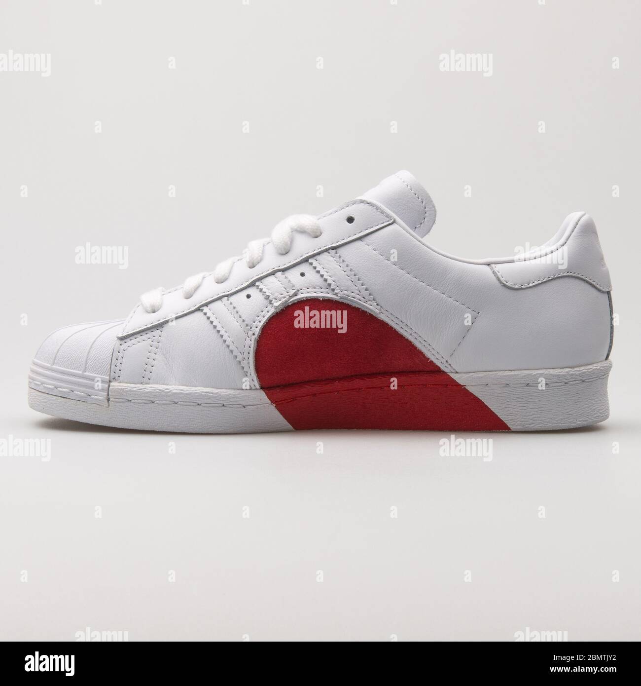 VIENNA, AUSTRIA - FEBRUARY 19, 2018: Adidas Superstar 80s HH white and red  sneaker on white background Stock Photo - Alamy