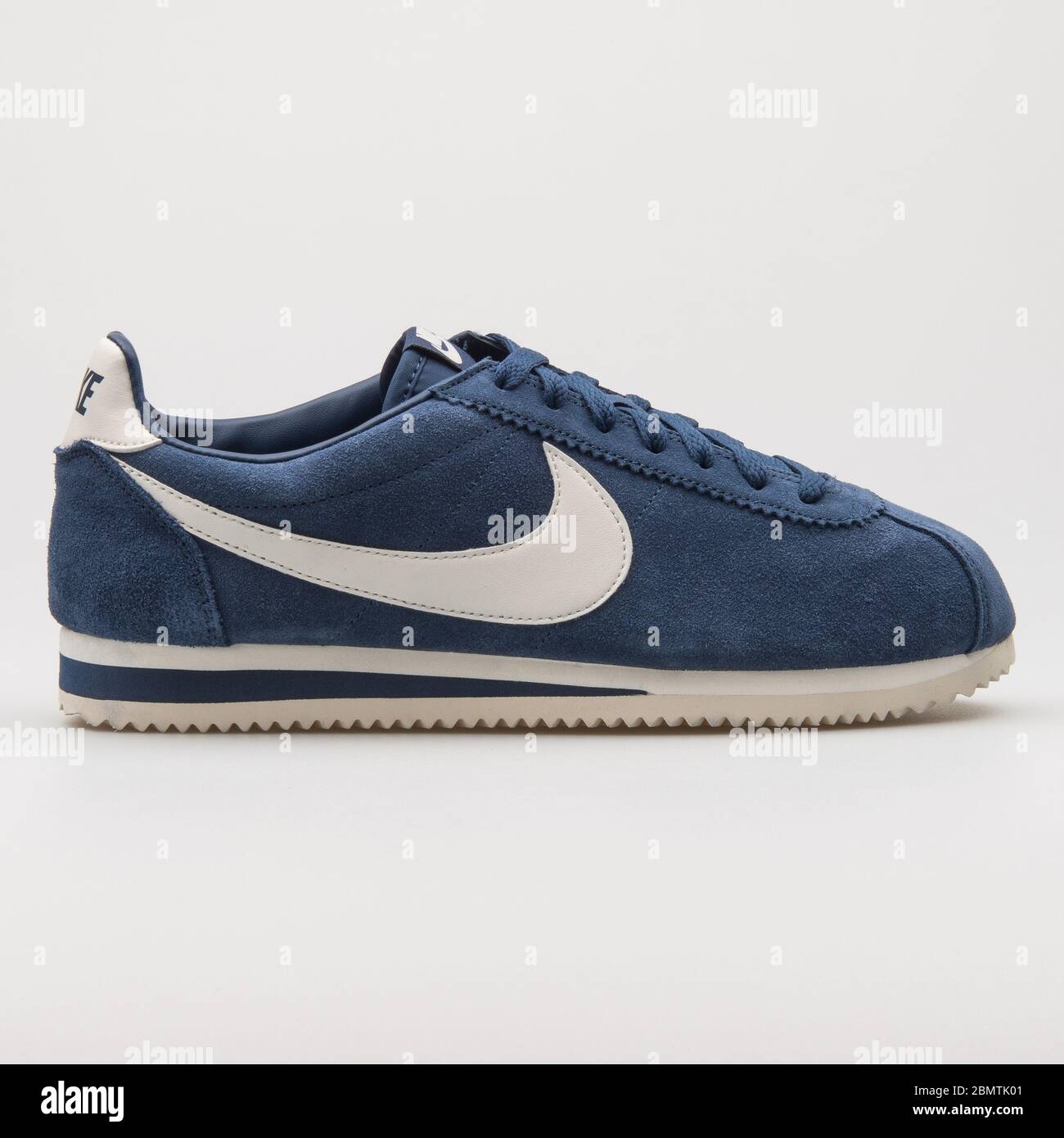 VIENNA, AUSTRIA - FEBRUARY 19, 2018: Nike Classic Cortez Suede navy blue  and white sneaker on white background Stock Photo - Alamy