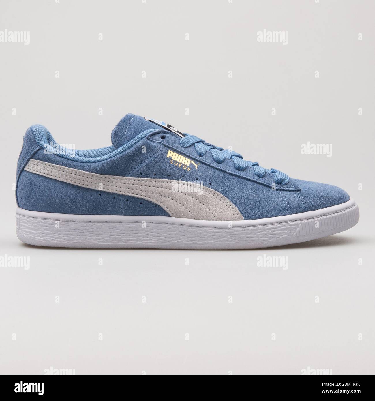 VIENNA, AUSTRIA - FEBRUARY 19, 2018: Puma Suede Classic blue and white  sneaker on white background Stock Photo - Alamy