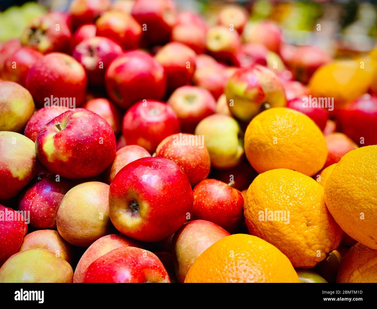 Oranges and apples. A closeup. Mobile photo. Supermarket Stock Photo