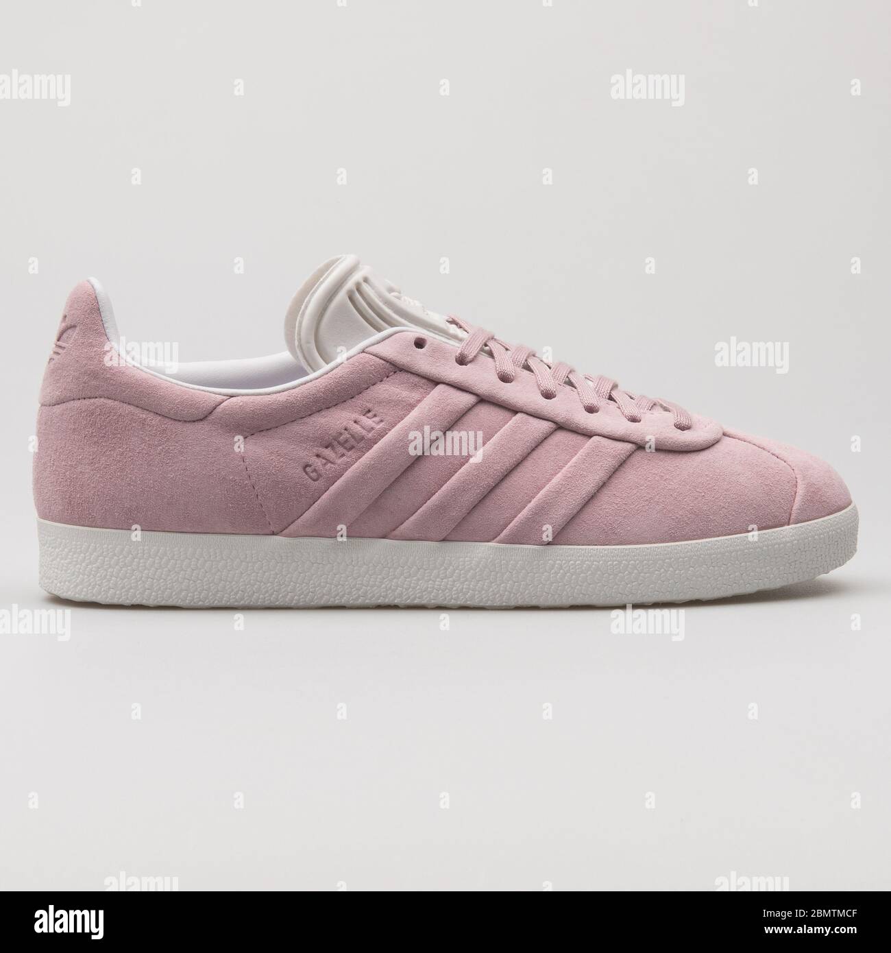 VIENNA, AUSTRIA - FEBRUARY 19, 2018: Adidas Gazelle Stitch And Turn pink  and white sneaker on white background Stock Photo - Alamy