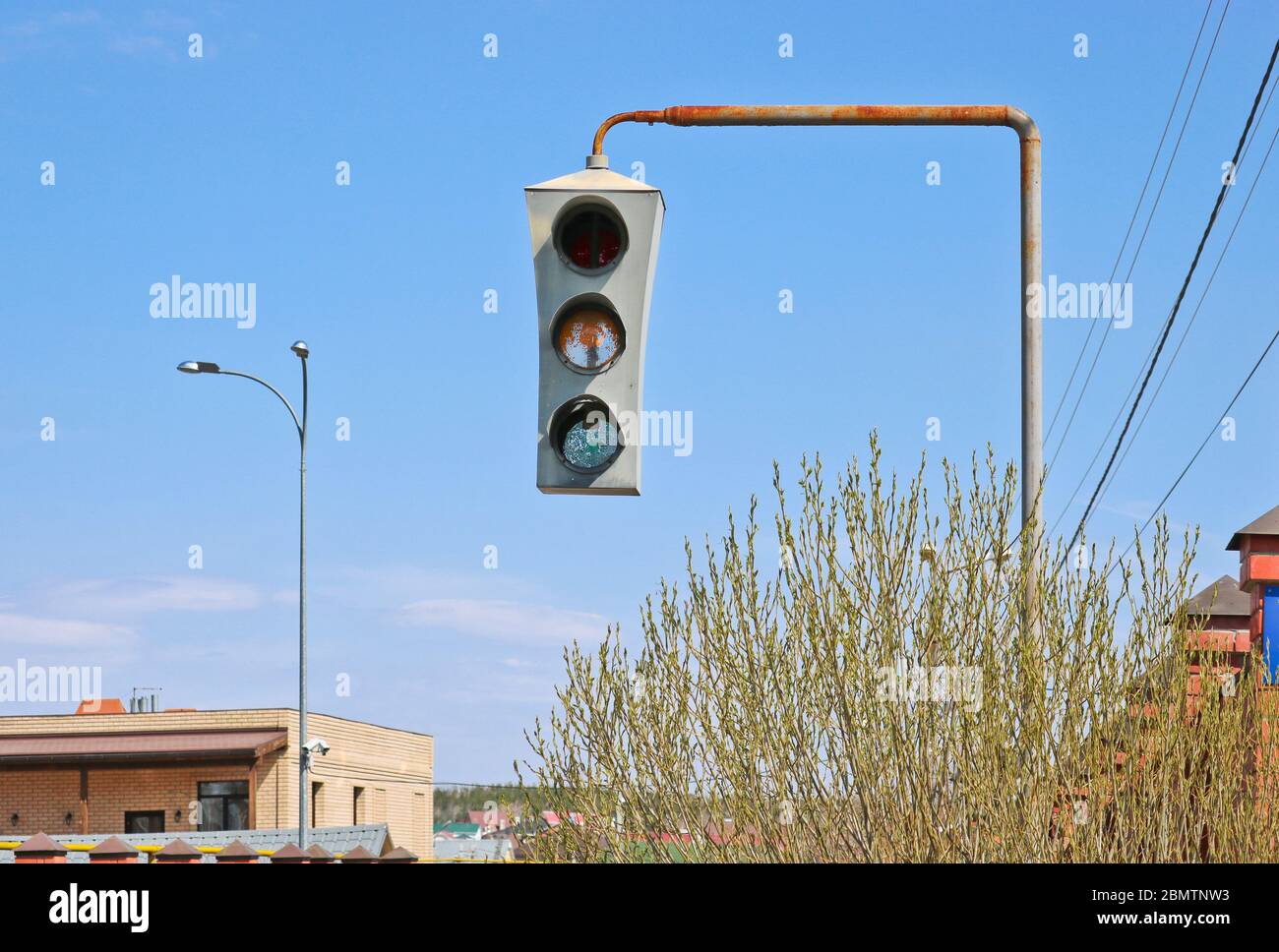 Vintage old traffic light on a rusty post. Closeup Stock Photo Alamy