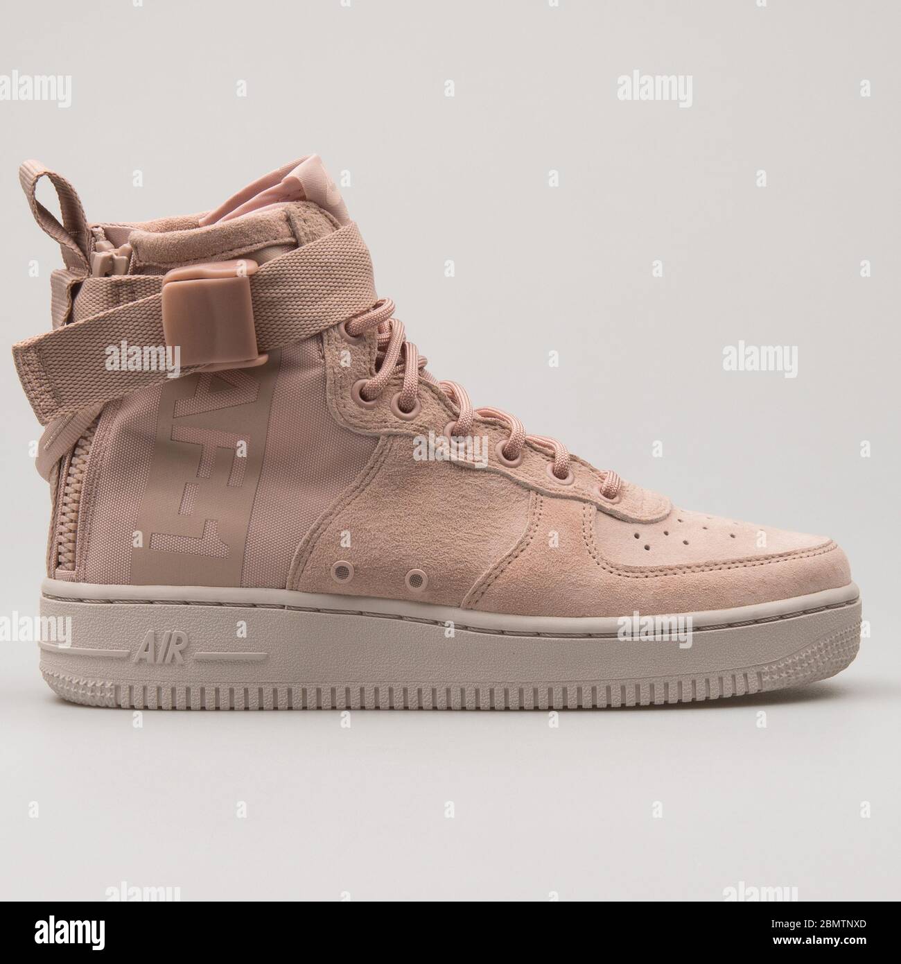 VIENNA, AUSTRIA - FEBRUARY 19, 2018: Nike SF Air Force 1 Mid beige sneaker  on white background Stock Photo - Alamy