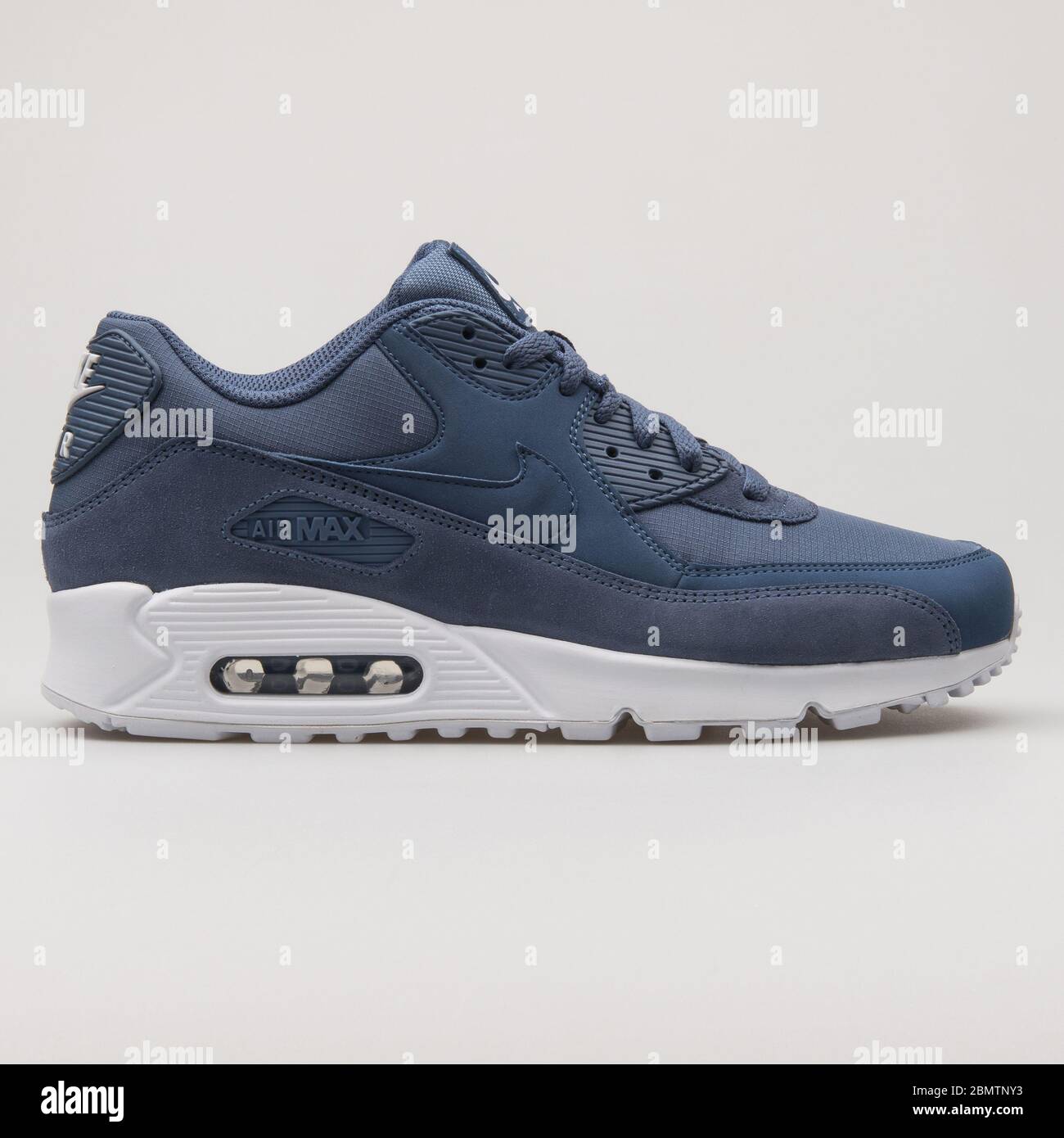VIENNA, AUSTRIA - FEBRUARY 19, 2018: Nike Air Max 90 Essential blue and  white sneaker on white background Stock Photo - Alamy