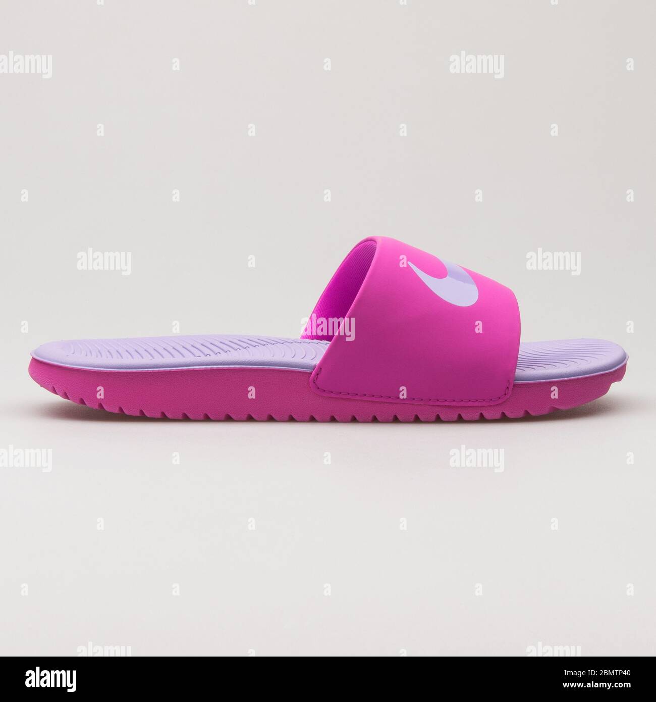 VIENNA, AUSTRIA - FEBRUARY 19, 2018: Nike Kawa Slide pink and purple sandal  on white background Stock Photo - Alamy