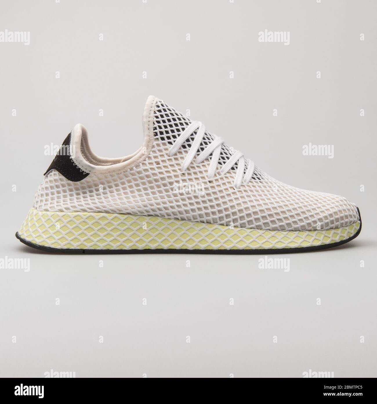 VIENNA, AUSTRIA - FEBRUARY 19, 2018: Adidas Deerupt Runner white and black  sneaker on white background Stock Photo - Alamy