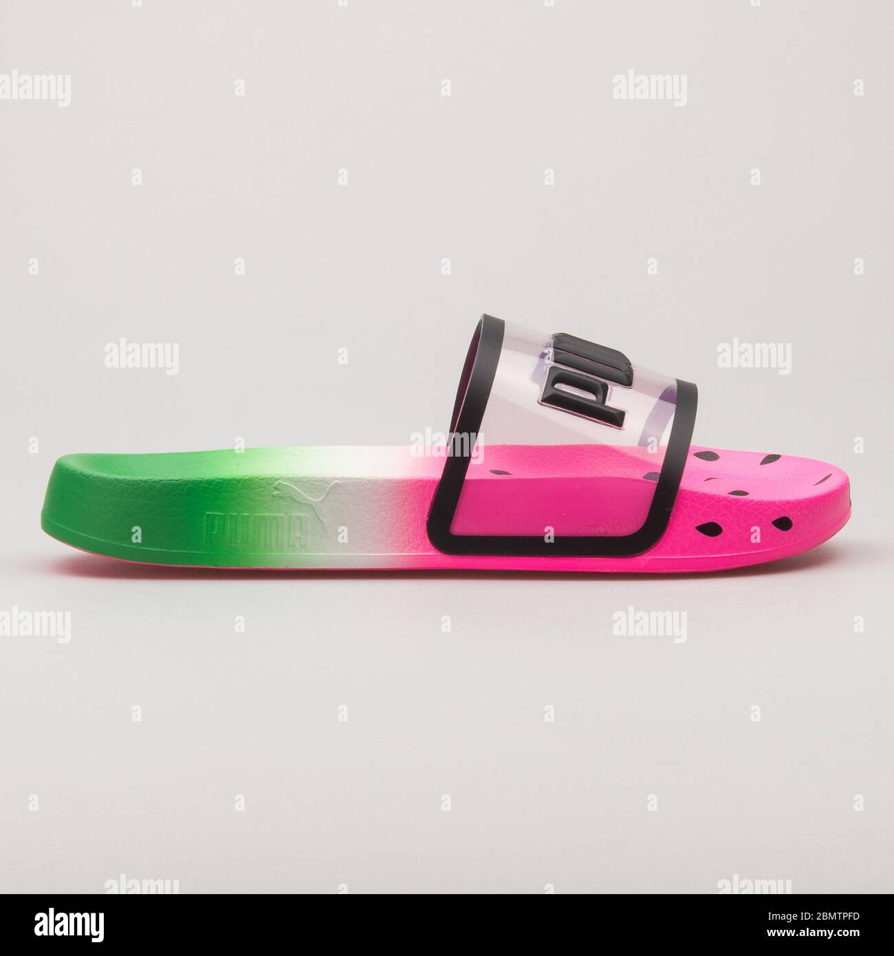 VIENNA, AUSTRIA - FEBRUARY 19, 2018: Puma Leadcat Candy Princess green,  pink, black and white sandal on white background Stock Photo - Alamy