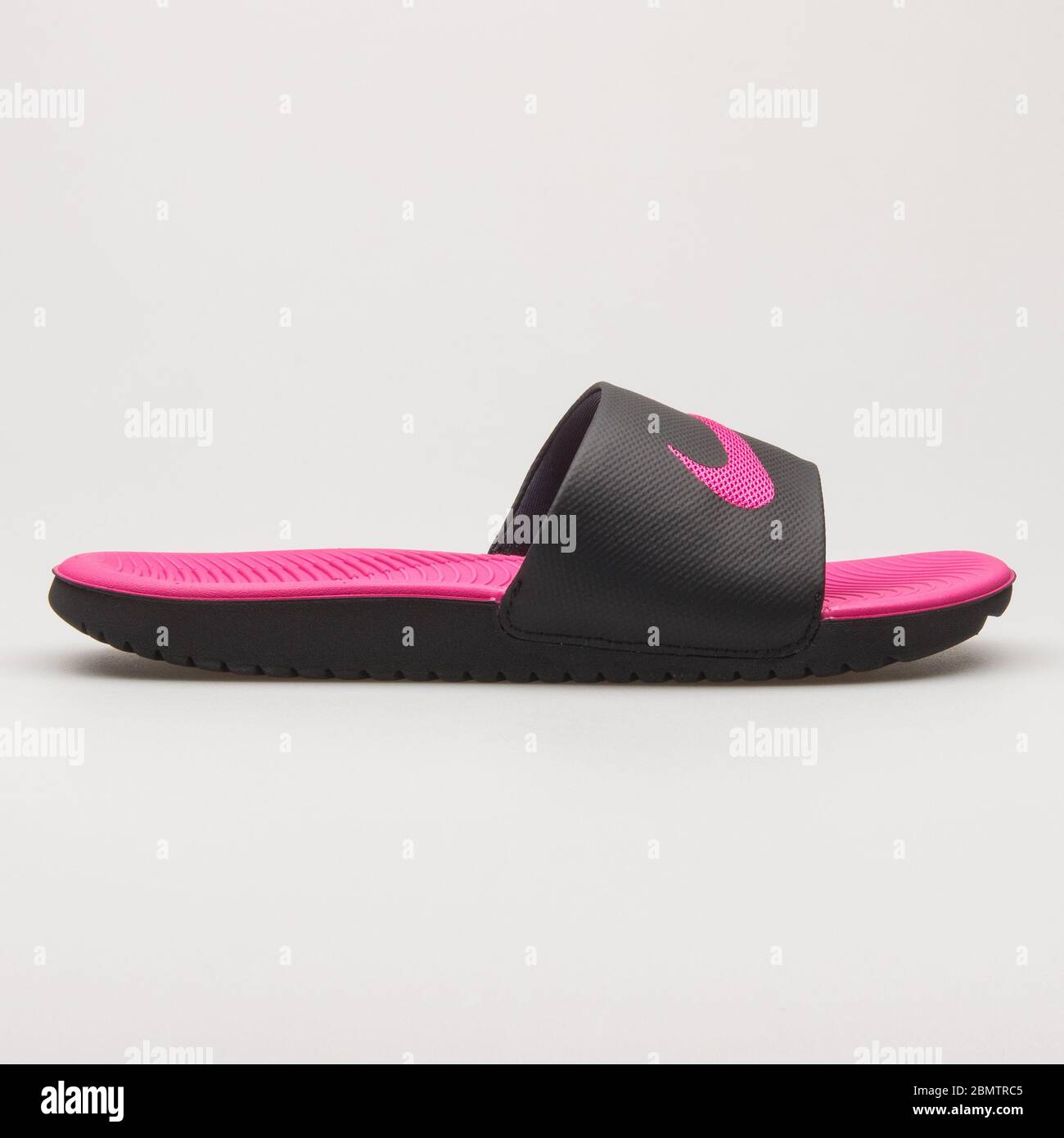 VIENNA, AUSTRIA - MAY 27, 2018: Nike Kawa Slide black and pink sandal on  white background Stock Photo - Alamy