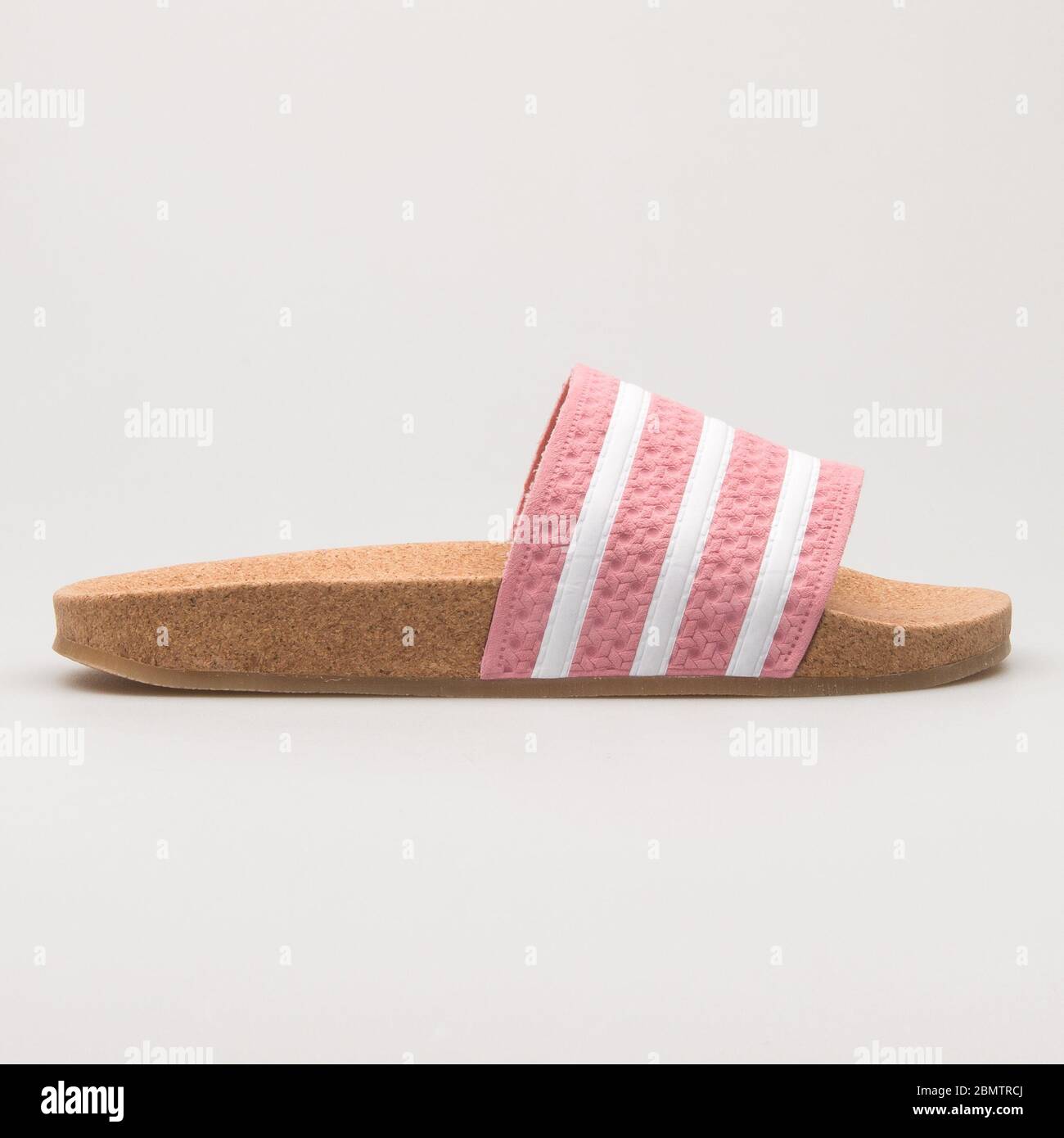 VIENNA, AUSTRIA - MAY 27, 2018: Adidas Adilette Cork pink and white sandal  on white background Stock Photo - Alamy