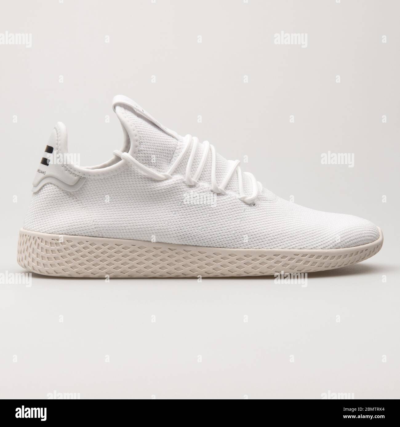 VIENNA, AUSTRIA - JUNE 14, 2018: Adidas PW Tennis HU white and black sneaker on white background. Stock Photo