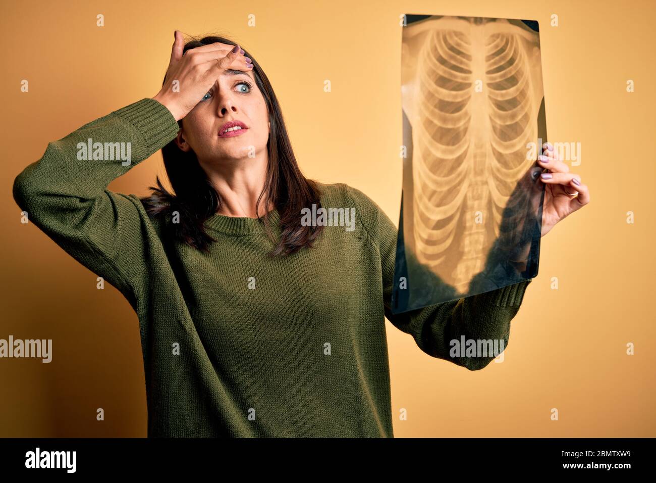 Sad woman hand over chest hi-res stock photography and images - Alamy