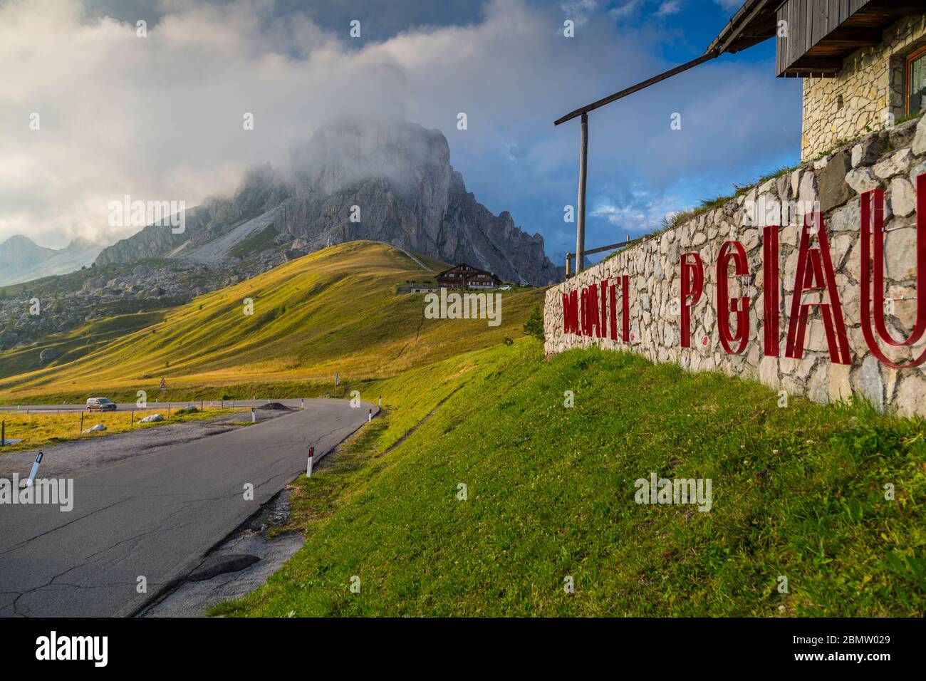 View of landscape and hotel from Marmolada Pass at sunset, South Tyrol, Italian Dolomites, Italy, Europe Stock Photo