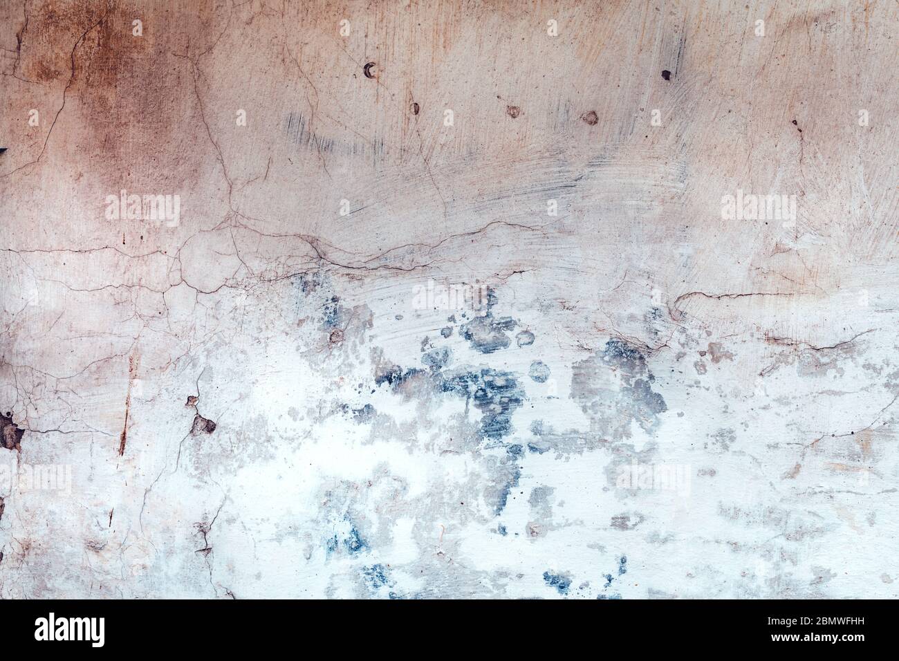 Texture of weathered cracked rustic wall as abstract background Stock Photo