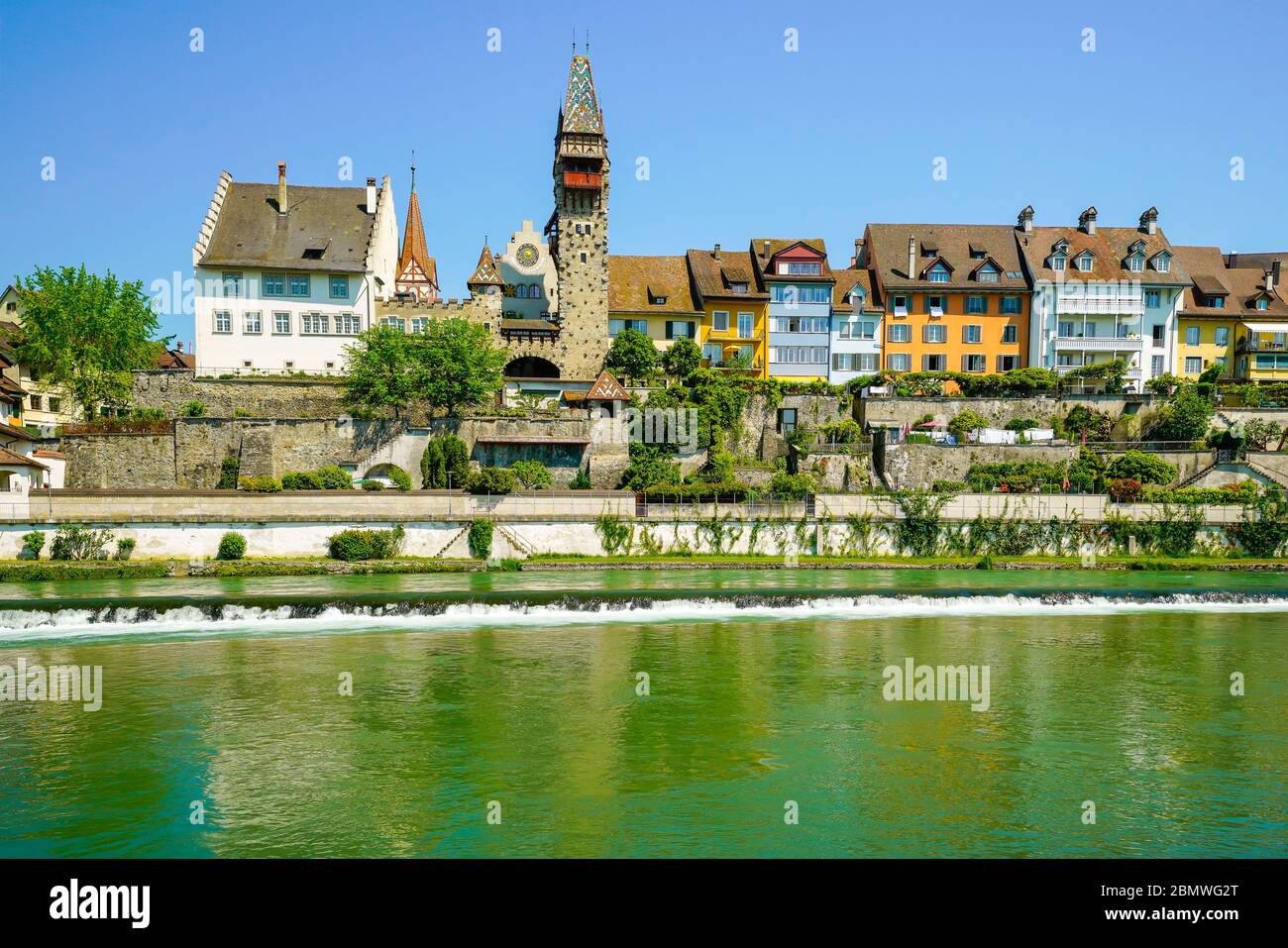 View of Bremgarten and the Muri-Amthof of seen from the Reuss river, Aargau Canton in Switzerland. Stock Photo