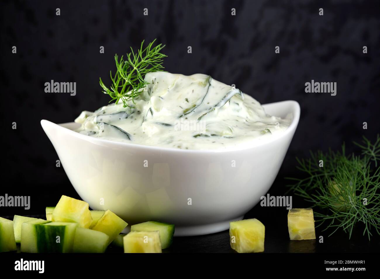 Cucumber yogurt salad with herbs Stock Photo