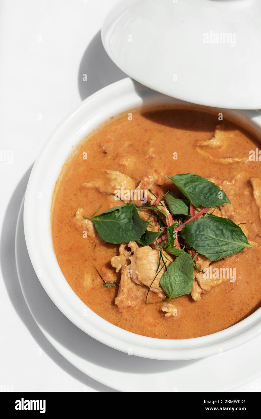 thai spicy panang pork curry with coconut milk on restaurant table in Phuket Thailand Stock Photo
