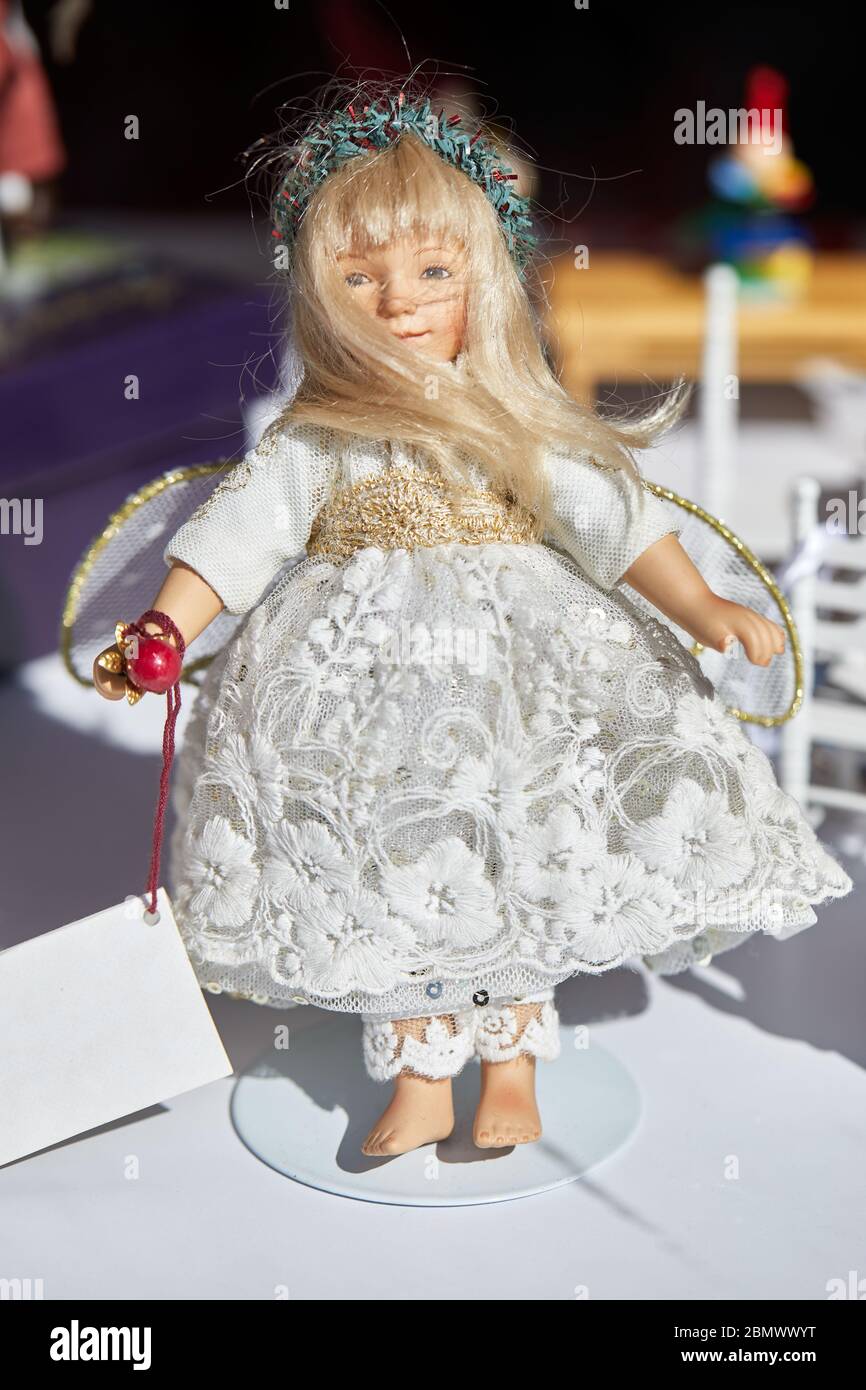 Small fairy-like doll in a shop window Stock Photo