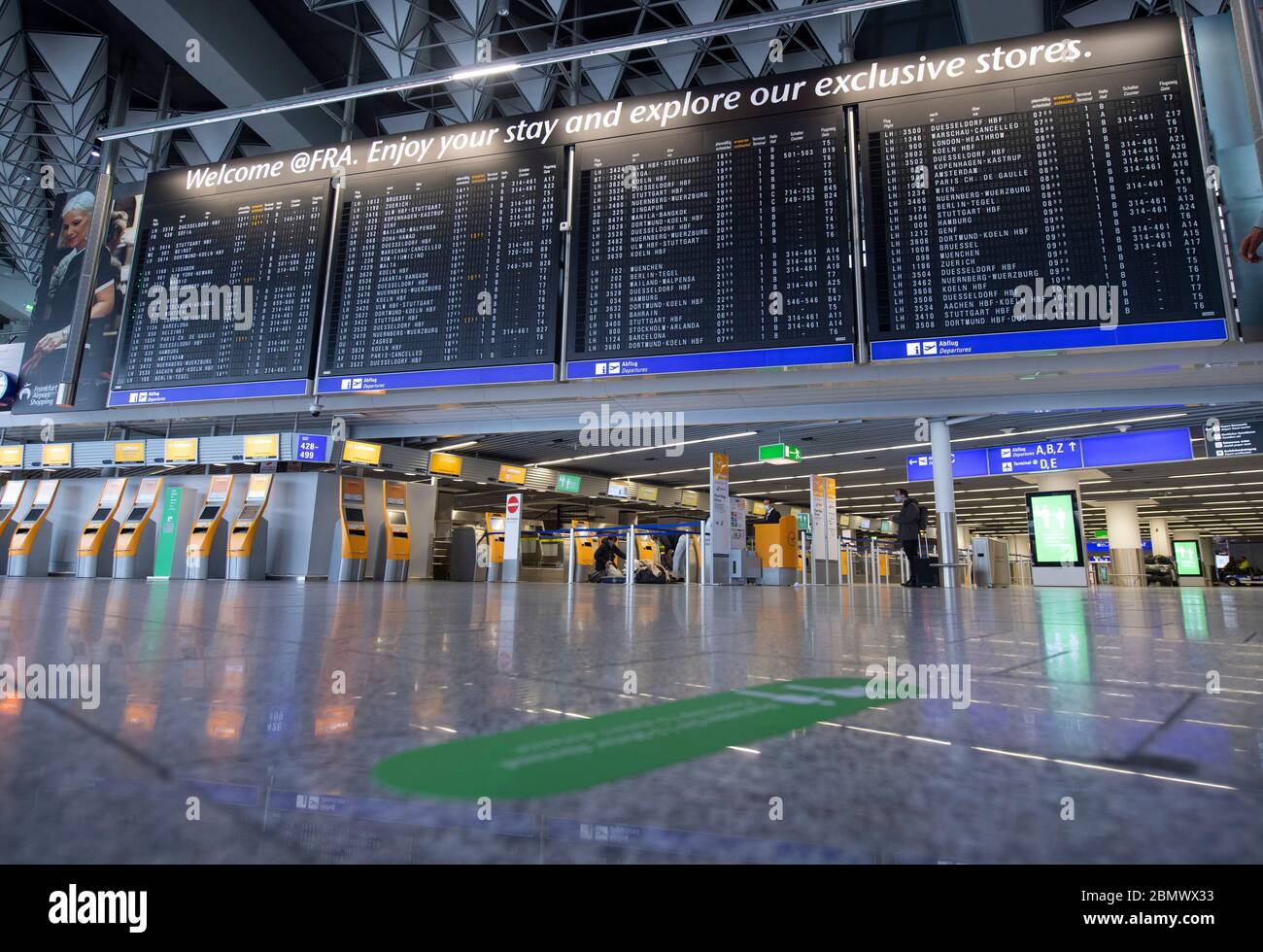 11 May 2020, Hessen, Frankfurt/Main: Terminal 1 of Frankfurt Airport is almost deserted at the Lufthansa check-in counters. Lufthansa has got into a massive financial imbalance as a result of the worldwide corona pandemic. Photo: Boris Roessler/dpa Stock Photo