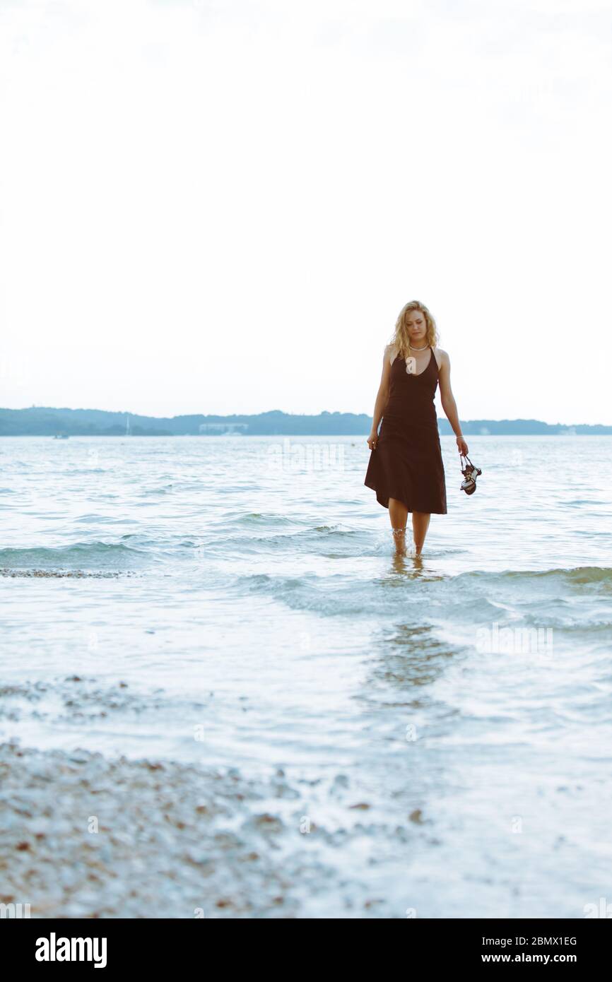 Beautiful woman barefoot walking hi-res stock photography and images ...