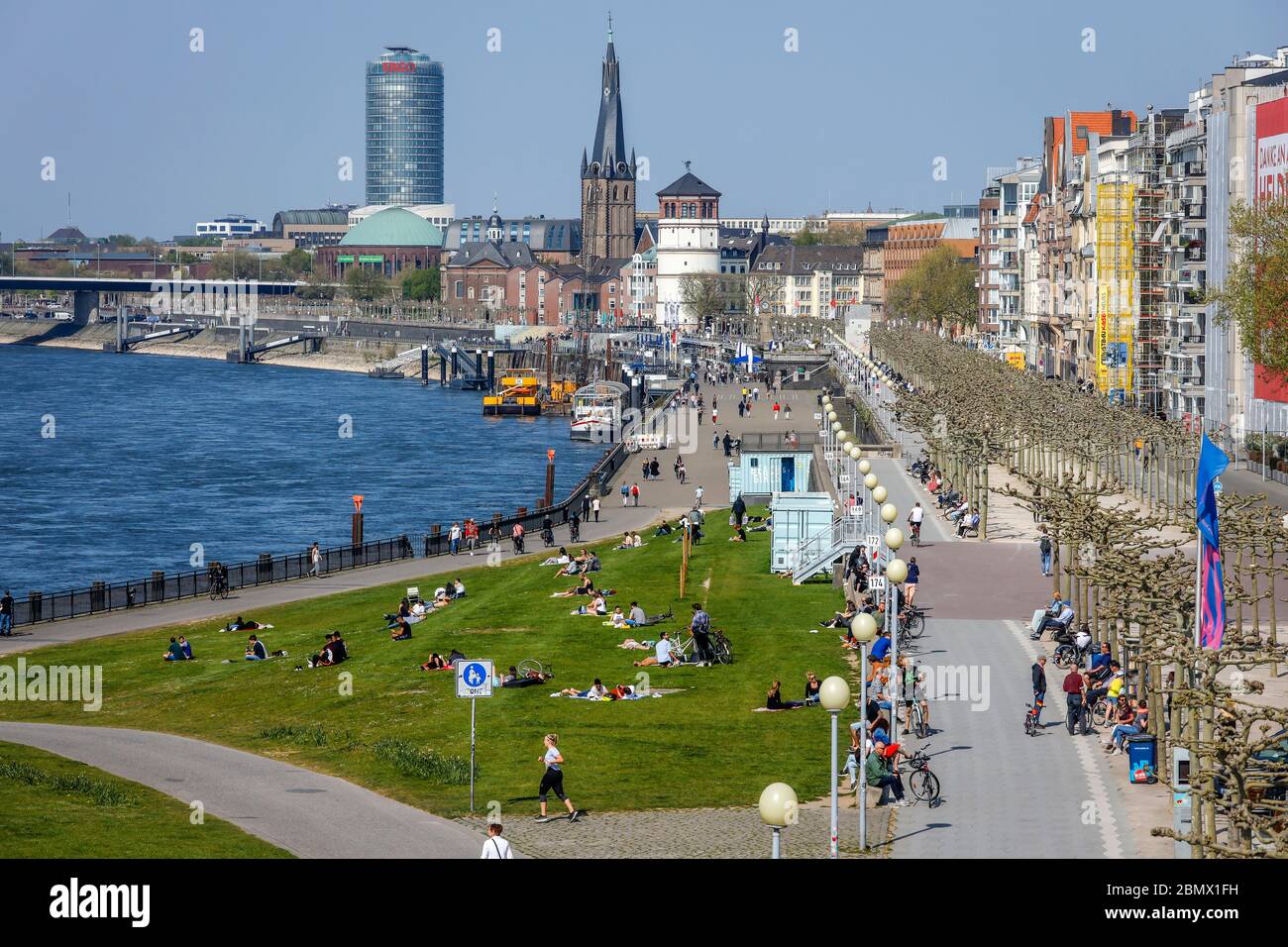 Duesseldorf, North Rhine-Westphalia, Germany - Rhine promenade in times of corona pandemic with contact ban. Duesseldorf, Nordrhein-Westfalen, Deutsch Stock Photo