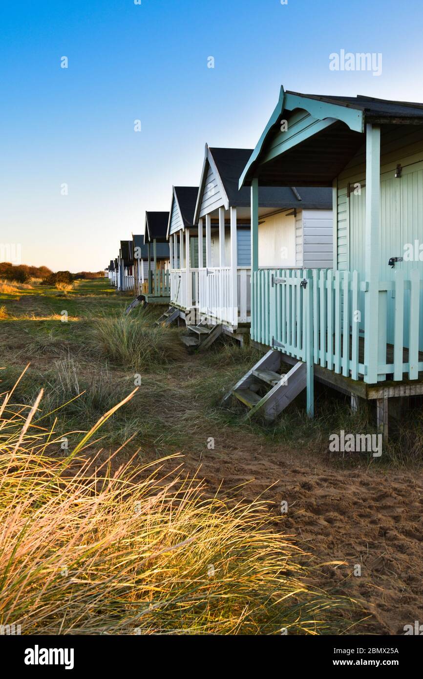 Colourful beach huts at Hunstanton, Norfolk, UK Stock Photo