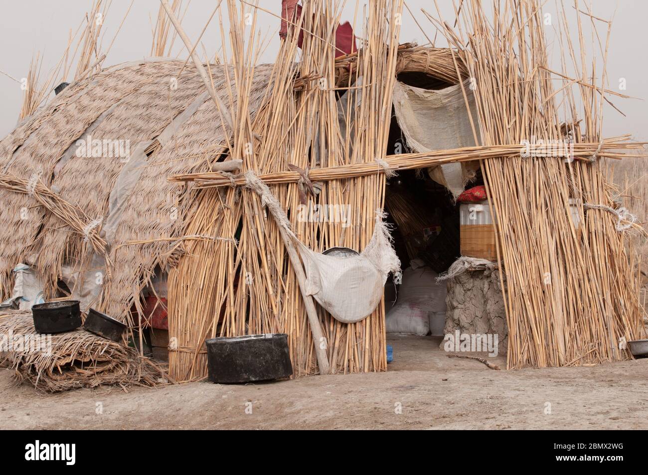 traditional buildings made from dried reeds, in the marshes of Southern Iraq Stock Photo