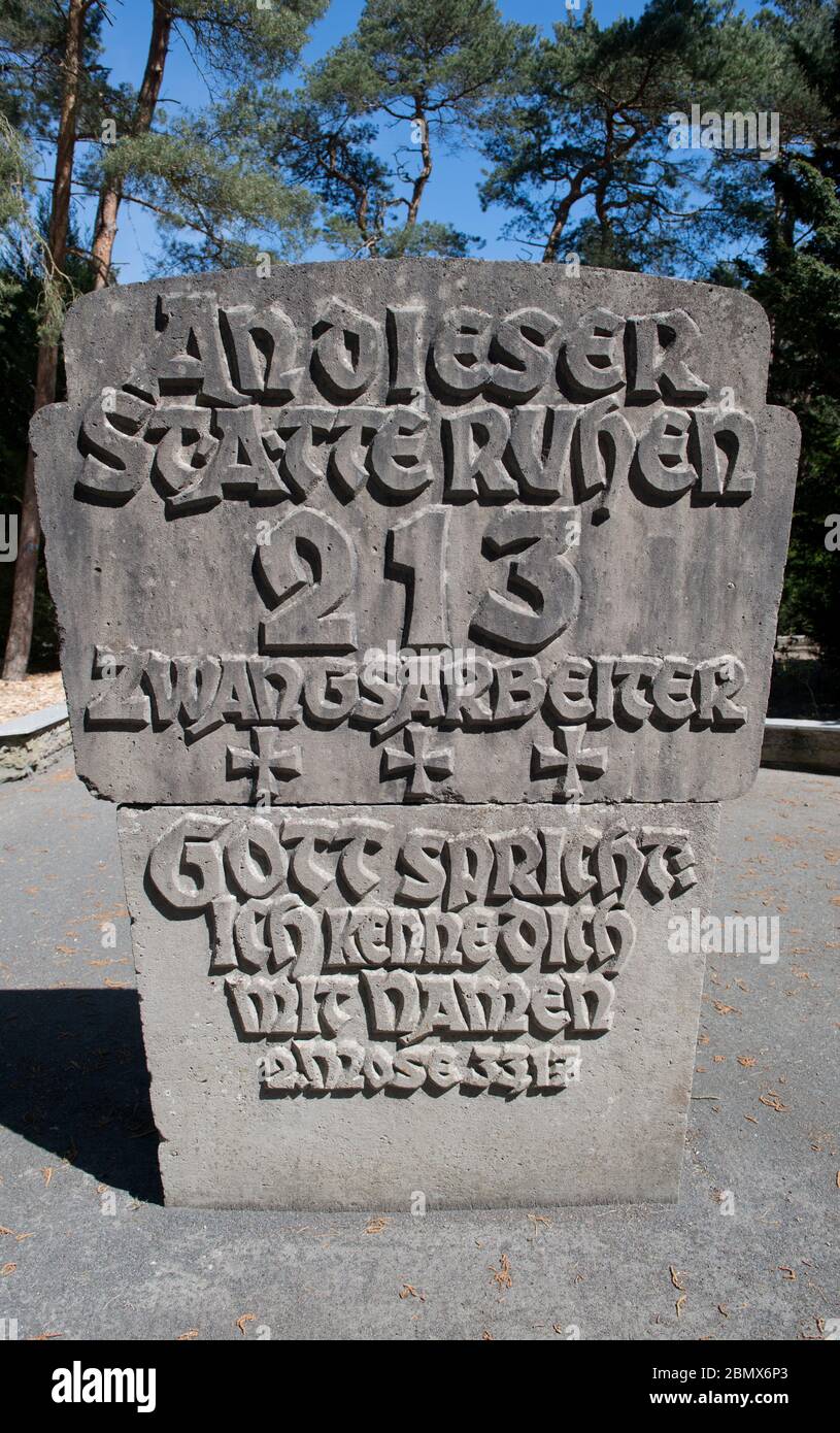 06 May 2020, Mecklenburg-Western Pomerania, Karlshagen: A gravestone on a  mass grave for 213 forced laborers. Peenemünde on the island of Usedom  became famous through the army research station "Peenemünde-Ost" and the