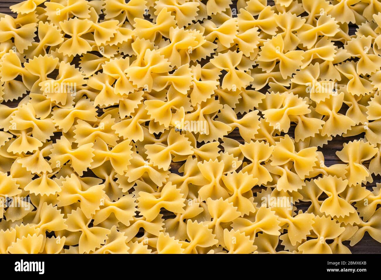 Download Pile Farfalle Yellow Pasta Abstract High Resolution Stock Photography And Images Alamy Yellowimages Mockups