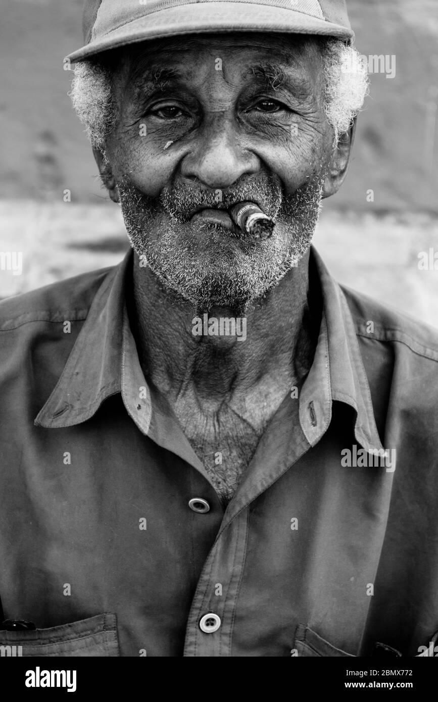 Man smoking a cigar, Trinidad, Cuba Stock Photo