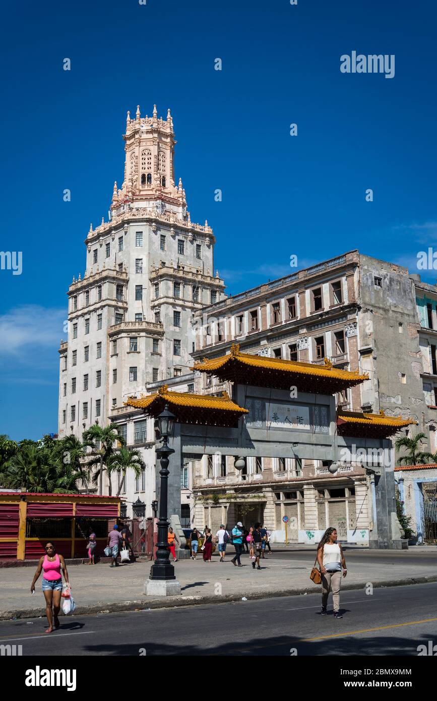 Cuban Telephone Company Art Deco building from 1927 designed by the Cuban architectural firm Morales and Company and Chinese Arch, Chinatown, Havana C Stock Photo