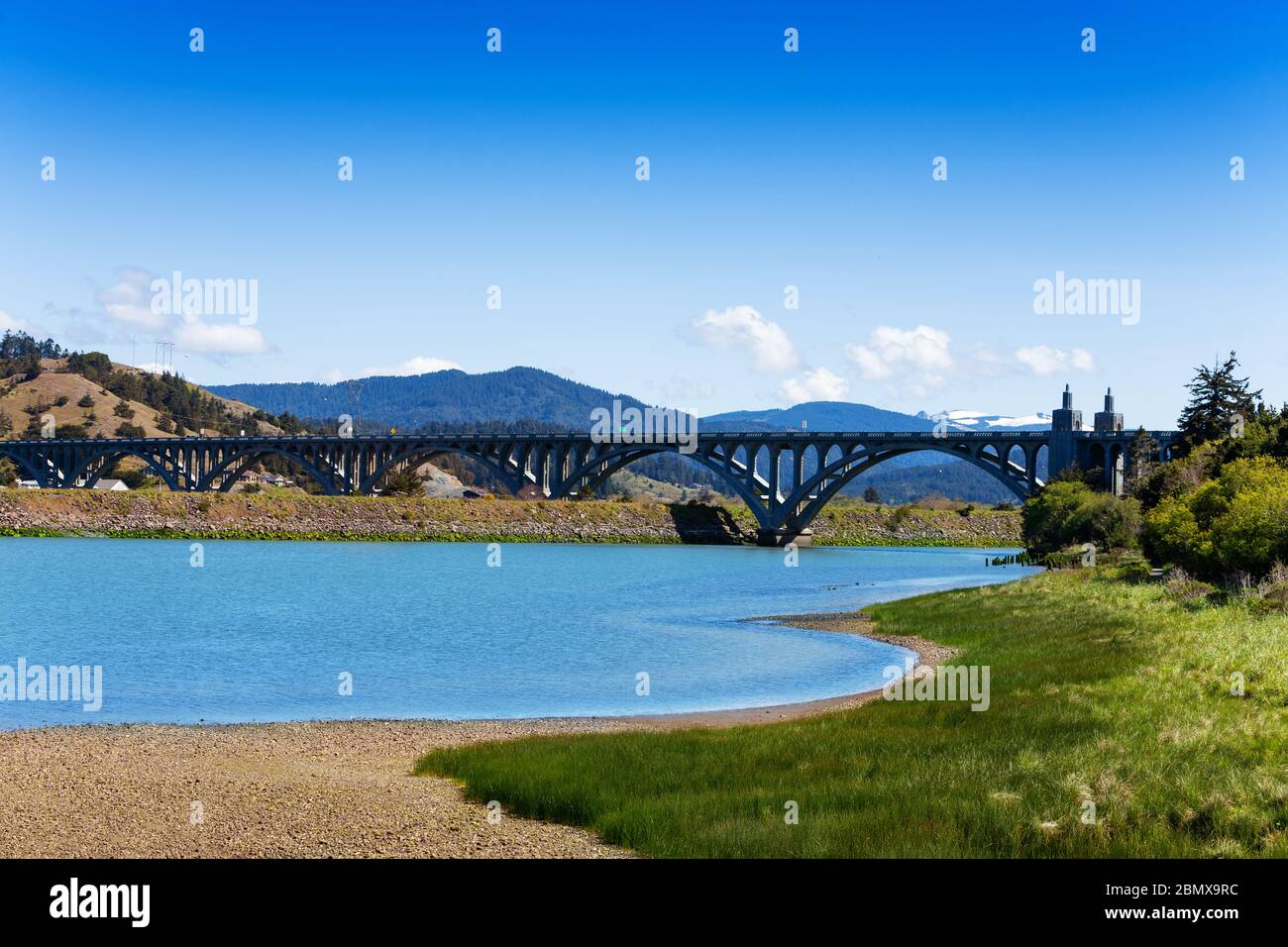 Rogue River or the Isaac Lee Patterson Memorial Bridge in Curry County, Oregon Stock Photo