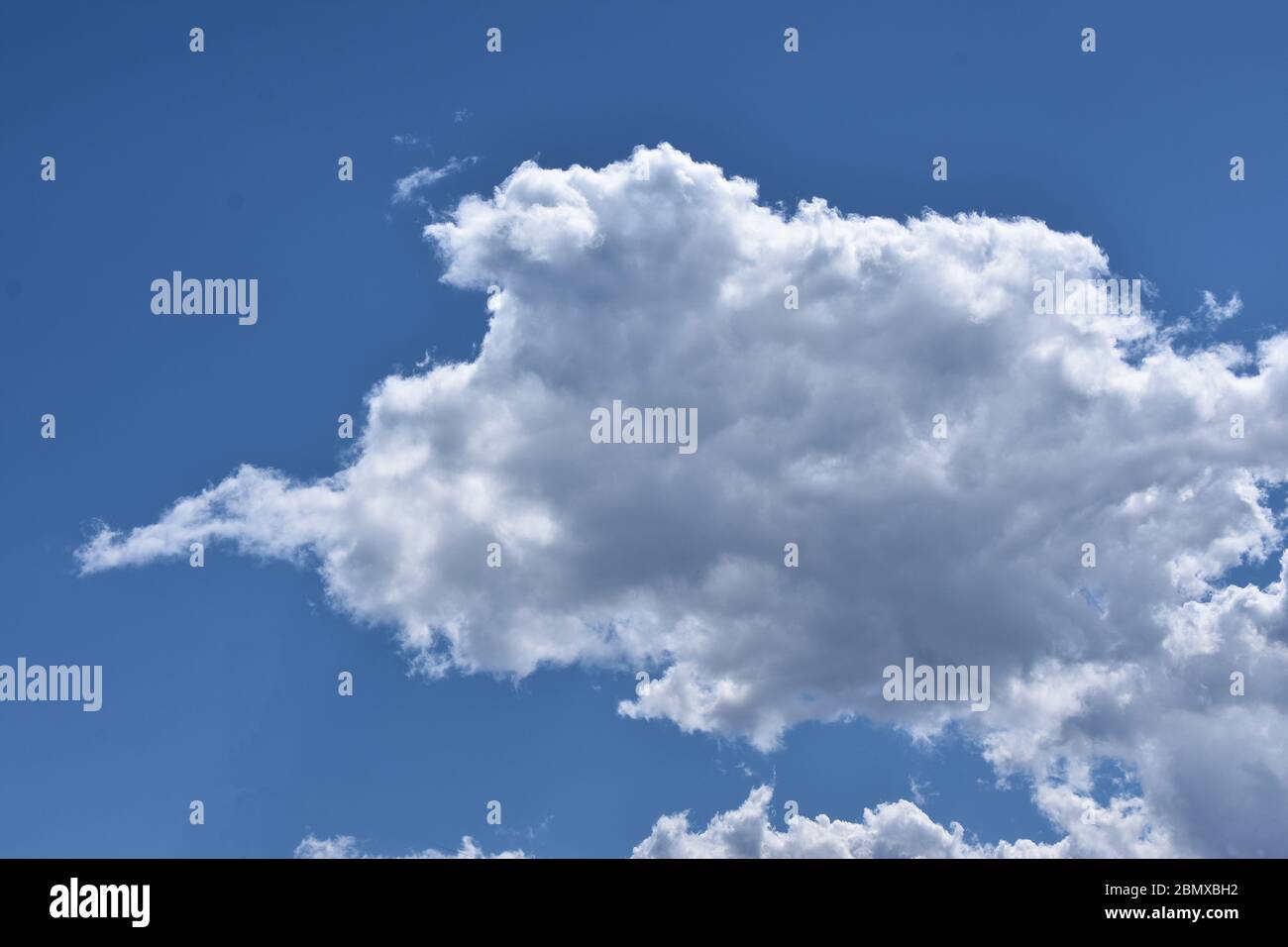 Big white cloud and blue sky Stock Photo - Alamy