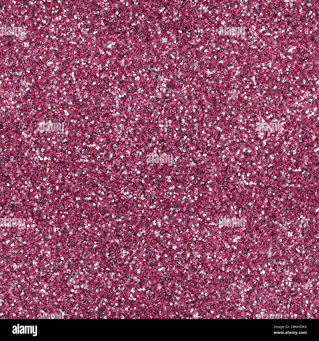 Elegant crimson glitter, sparkle confetti texture. Christmas abstract background, seamless pattern. Stock Photo
