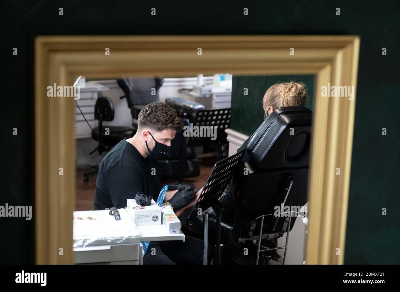 Stuttgart Germany 11th May 2020 An Employee Of The Tattoo Studio Mommy I M Sorry Tattoos A Customer On Her Forearm From 11 May Onwards Relaxed Corona Rules Apply In Baden Wurttemberg Among Other