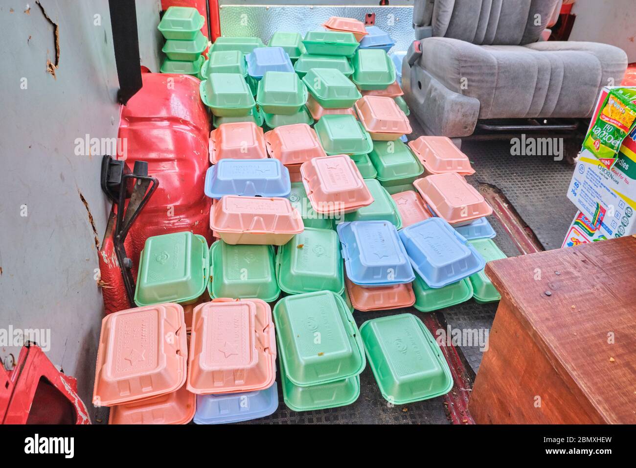 Food packs placed in a bus for distribution to  people during Covid-19 lockdown in Lagos, Nigeria Stock Photo