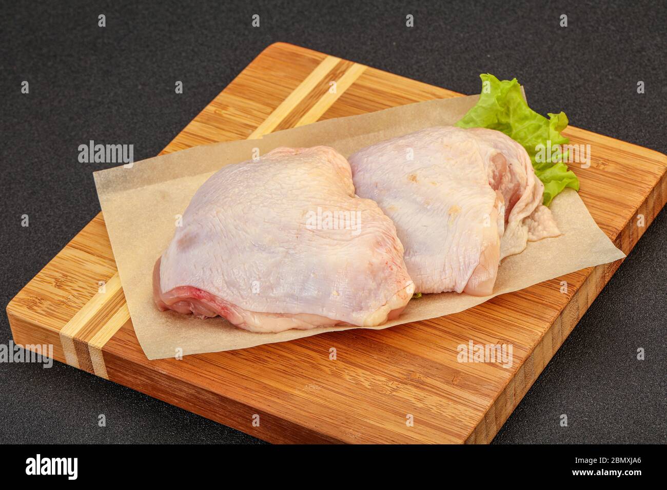 Raw chicken hip ready for cooking Stock Photo Alamy