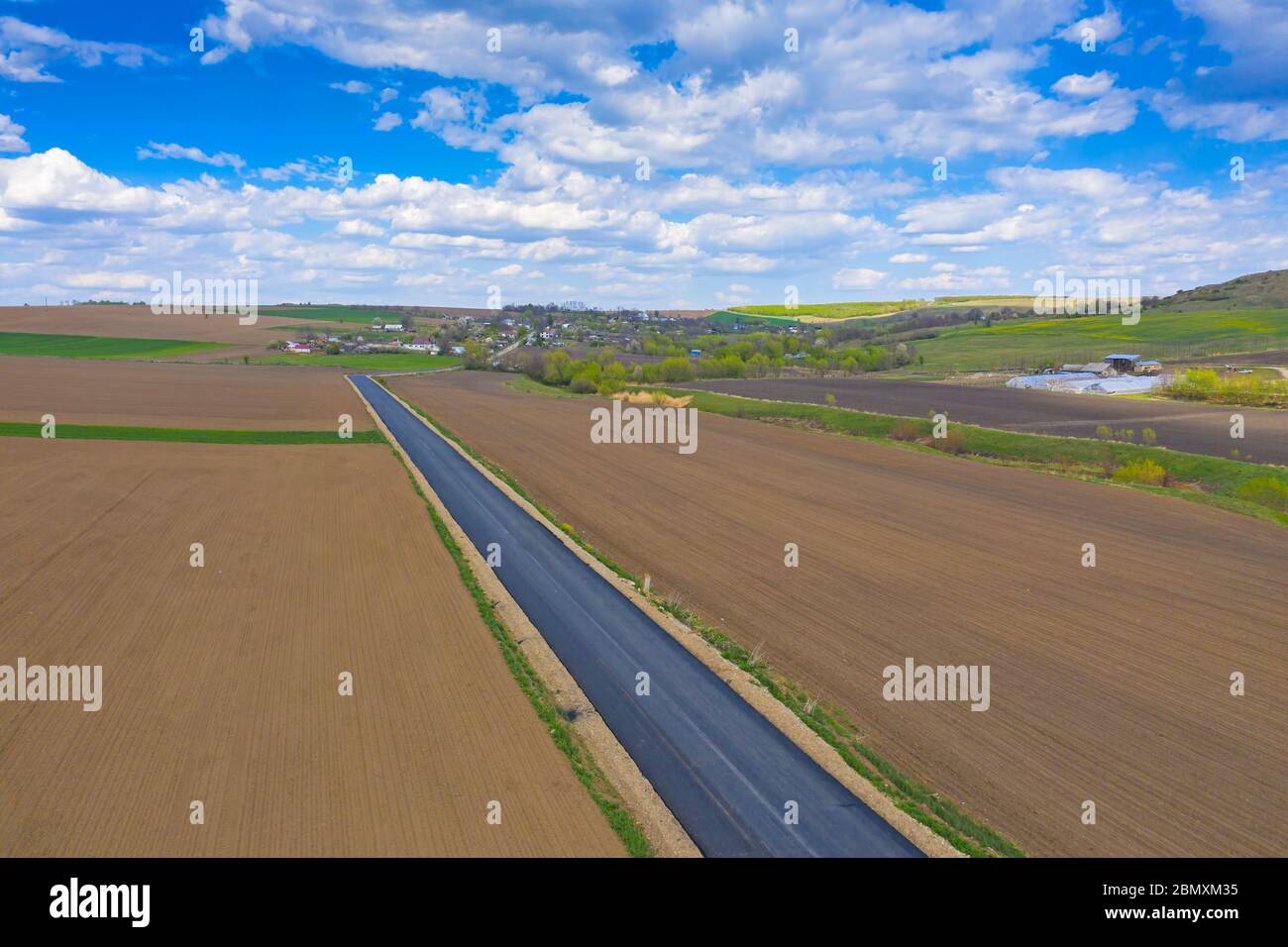 Aerial view of new road access and spring village Stock Photo - Alamy