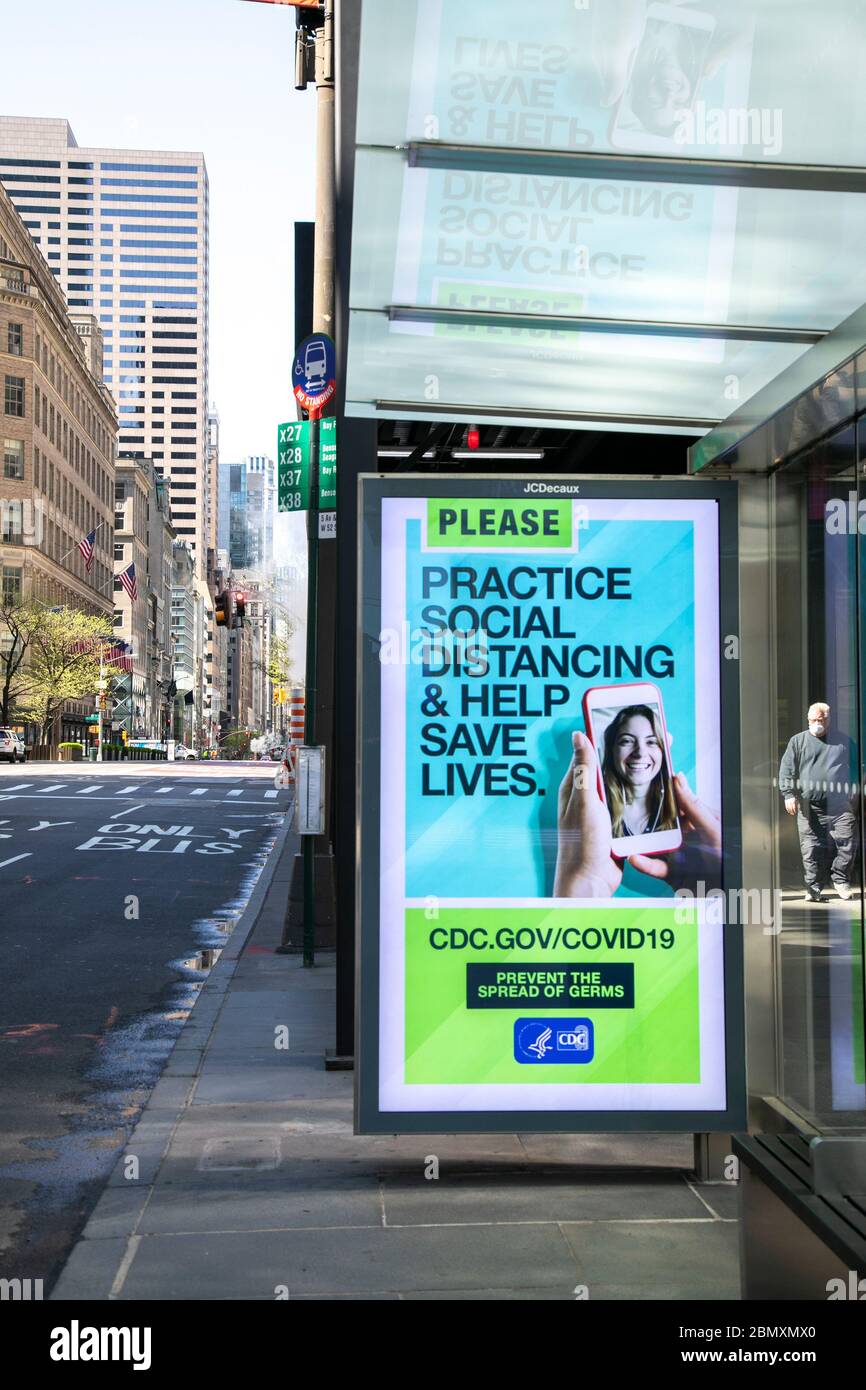 Bus stop electronic sign about COVID19 in New York City. Stock Photo