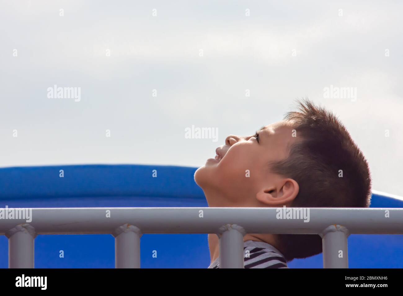 Portrait of Asian boy Look up at the sky Playground Stock Photo