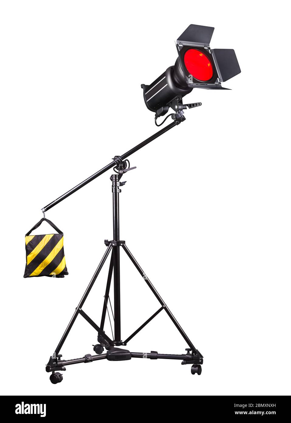 Photography studio flash on a lighting stand isolated on white ...