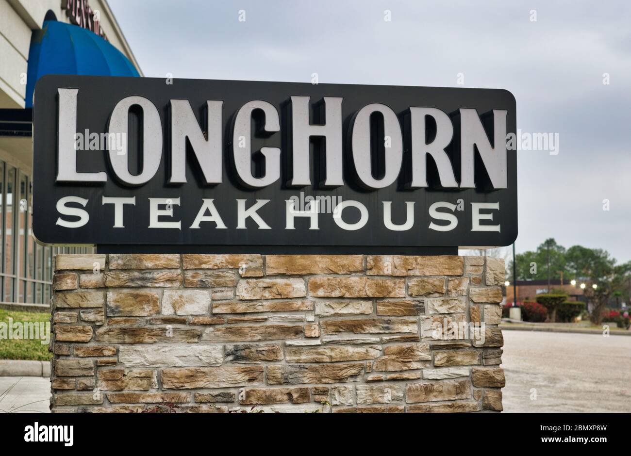 Longhorn Steakhouse sign in Deerbrook Mall in Humble, TX. A popular American steakhouse founded in 1981 with a Western-Texan theme. Stock Photo