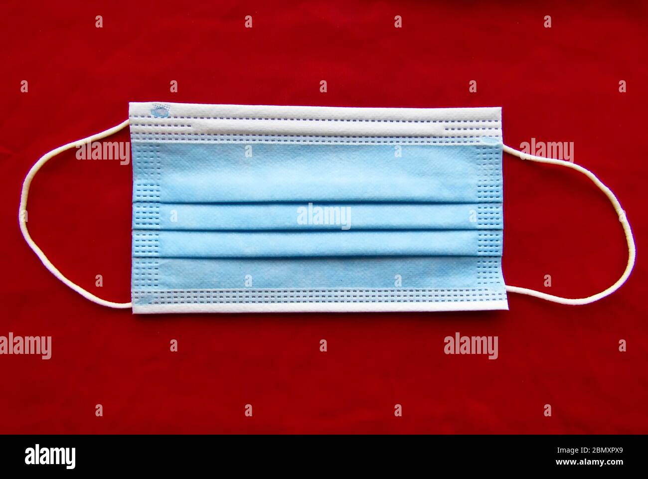 Blue protective face mask hi-res stock photography and images - Alamy