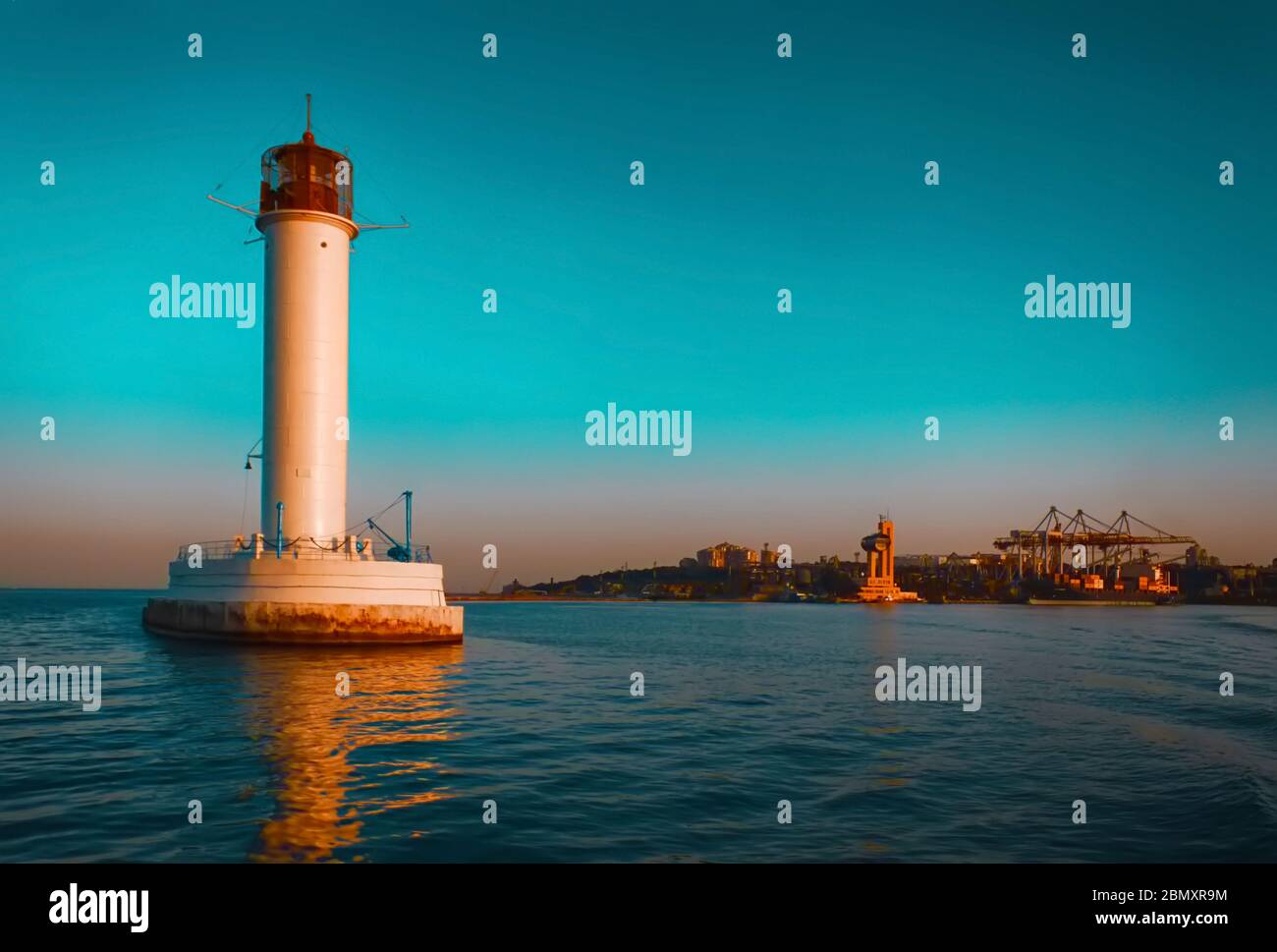 Historic Vorontsov lighthouse in the Black Sea port of Odessa, Ukraine. Evening time. Teal and orange filter Stock Photo