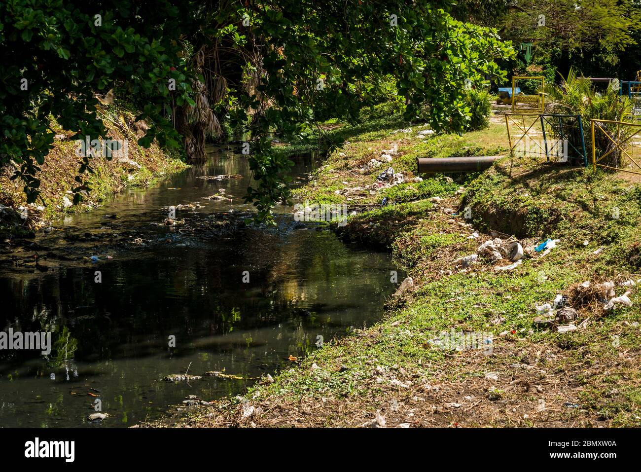 Rubbish thrown into the river, Santa Clara, Cuba Stock Photo