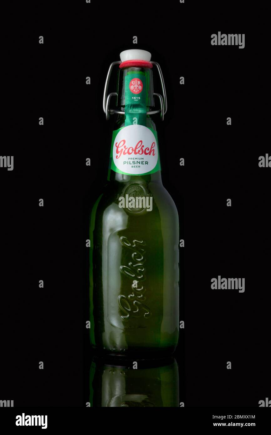 Paris, France - May 05 2020: Bottle of Dutch beer (Grolsch) isolated on black background. Stock Photo