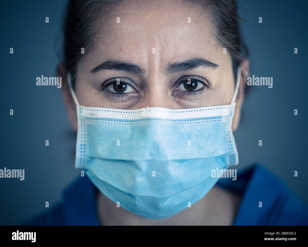 Stop the spread and Save lives campaign. Doctor wearing protection face mask. Protect yourself and others medical advice, basic protective measures ag Stock Photo